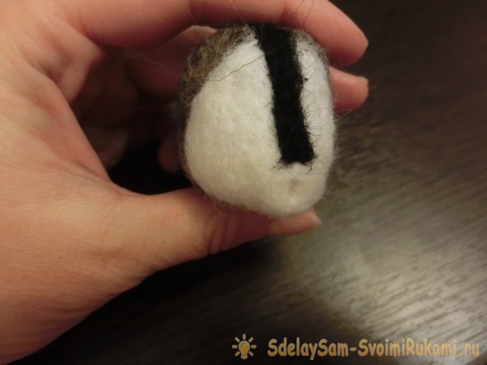 Валяный енот из шерсти