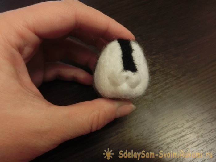 Валяный енот из шерсти