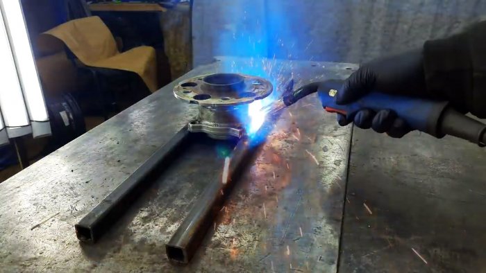 Катушка для шланга из диска и ступицы автомобиля