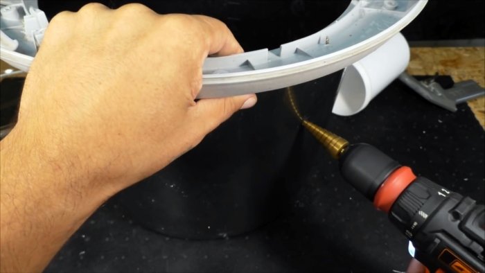 Из люка стиралки можно сделать полезную вещь для мастерской