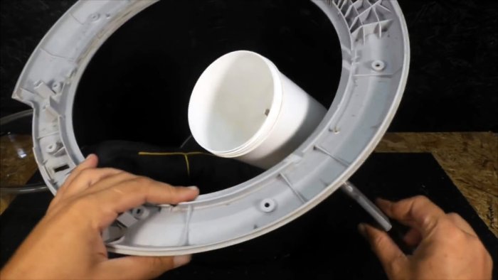 Из люка стиралки можно сделать полезную вещь для мастерской