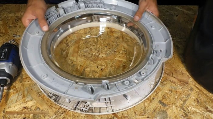 Из люка стиралки можно сделать полезную вещь для мастерской