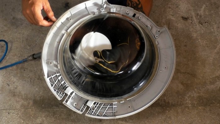 Из люка стиралки можно сделать полезную вещь для мастерской
