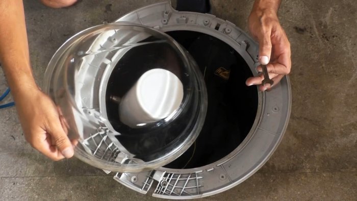 Из люка стиралки можно сделать полезную вещь для мастерской