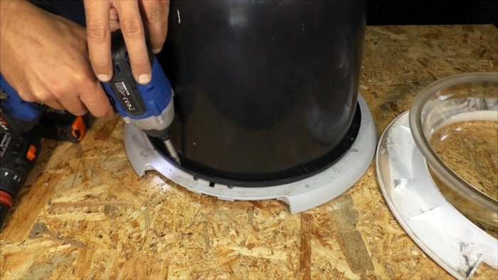 Из люка стиралки можно сделать полезную вещь для мастерской