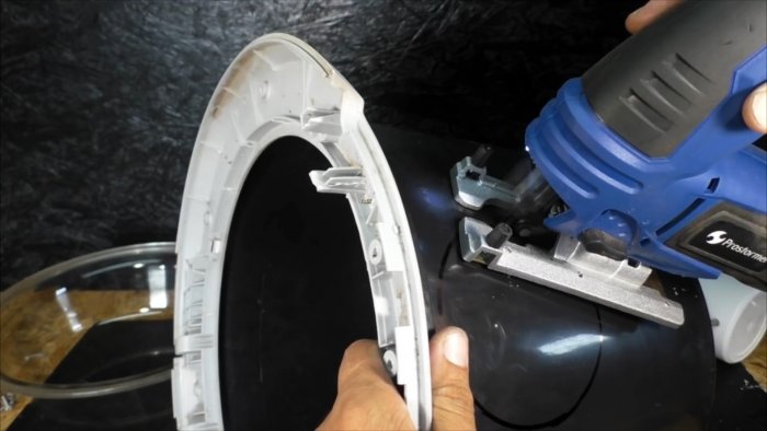 Из люка стиралки можно сделать полезную вещь для мастерской